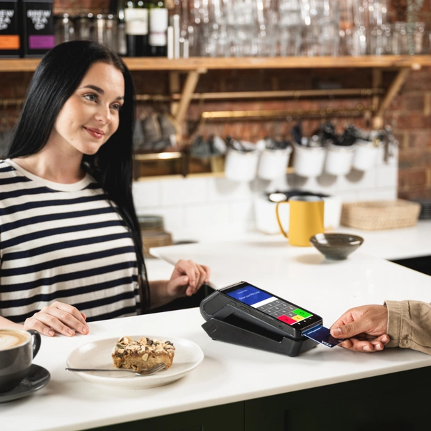 Card payment on a terminal in a cafe