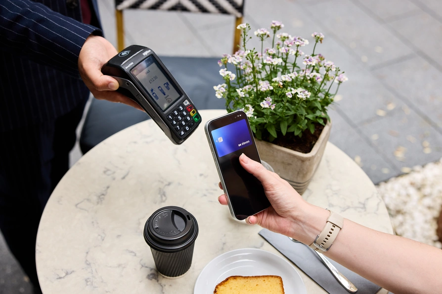 mobile wallet payment at a table