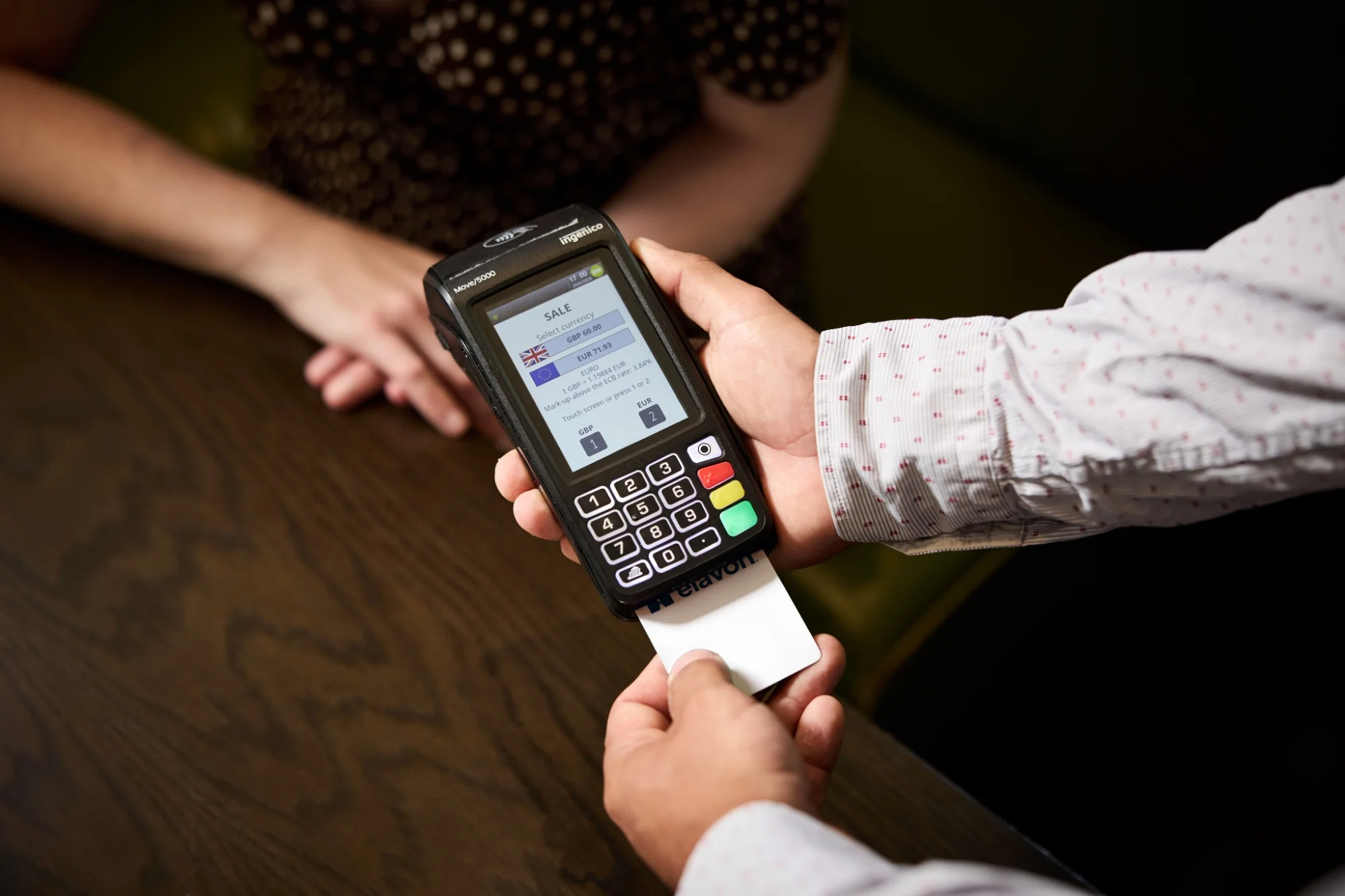 Payment terminal presenting currency options at the Grand Hotel Birmingham