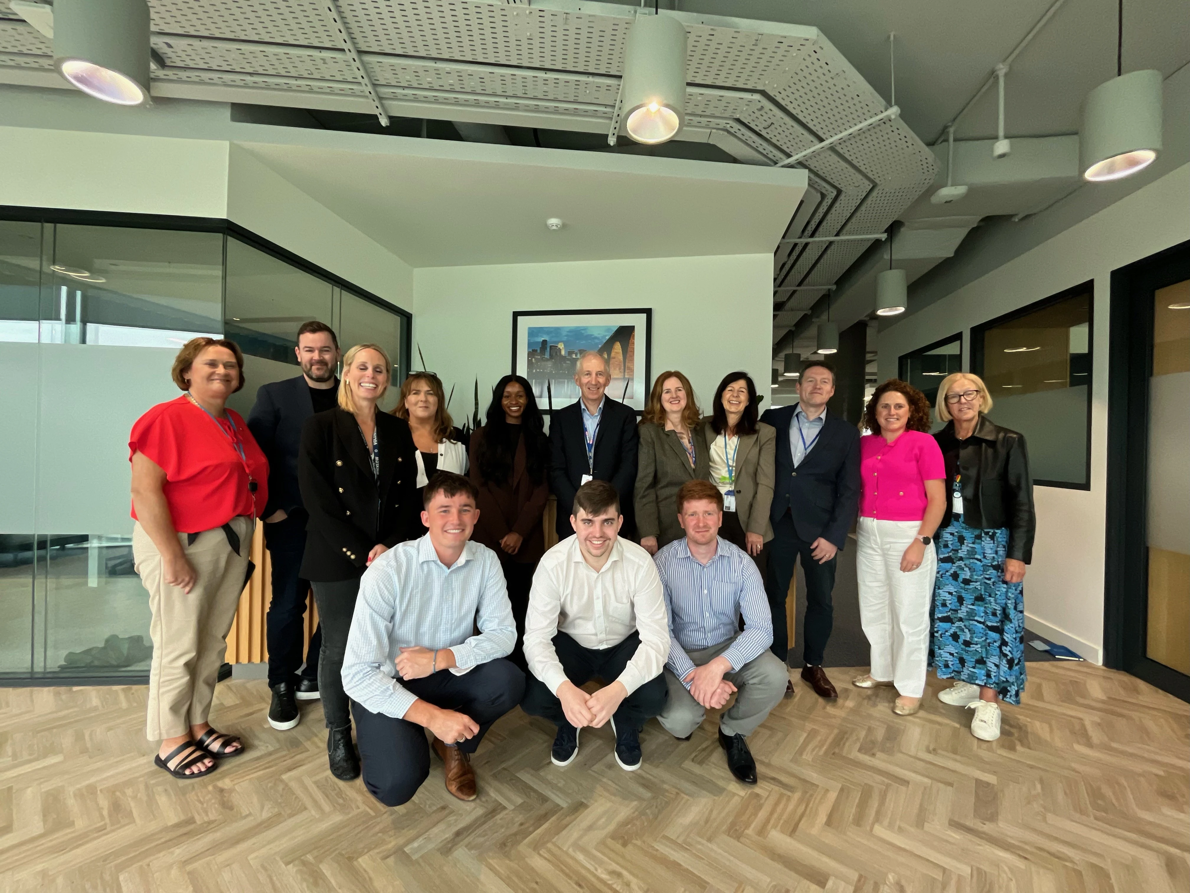 Group photo with graduate members and leadership team